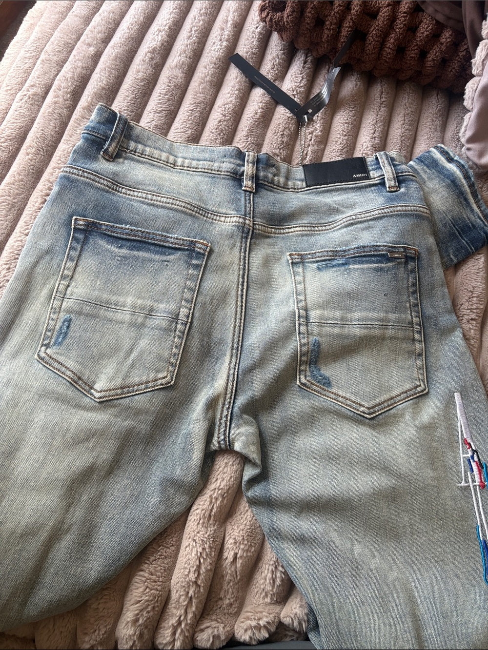 AMIRI Light Blue Washed Distressed Jeans with Multicolor Embroidery - Picture 3 of 3